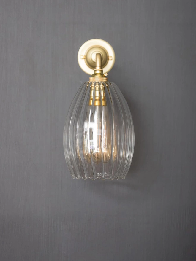 Small Clear Ribbed Glass Molly Wall Light In Brushed Brass