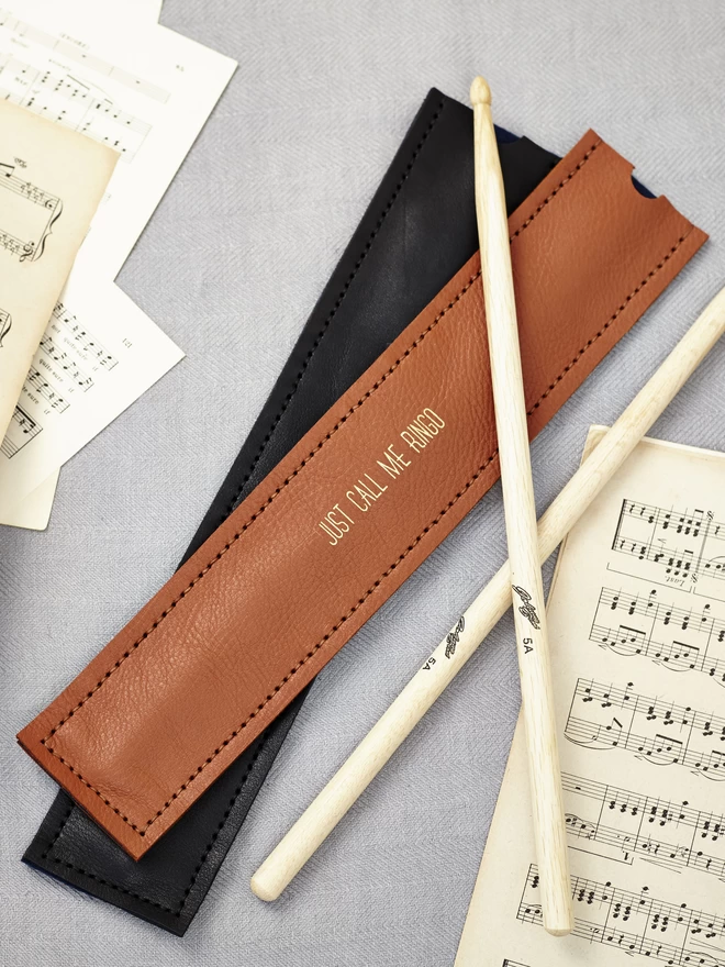 Tan leather drumstick holder, personalised with 'just call me ringo'