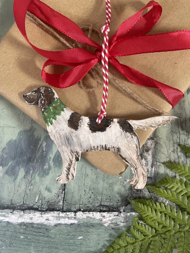 Springer Spaniel Dog Portrait decoration with Holly wreath and red and white bakers twine to hang
