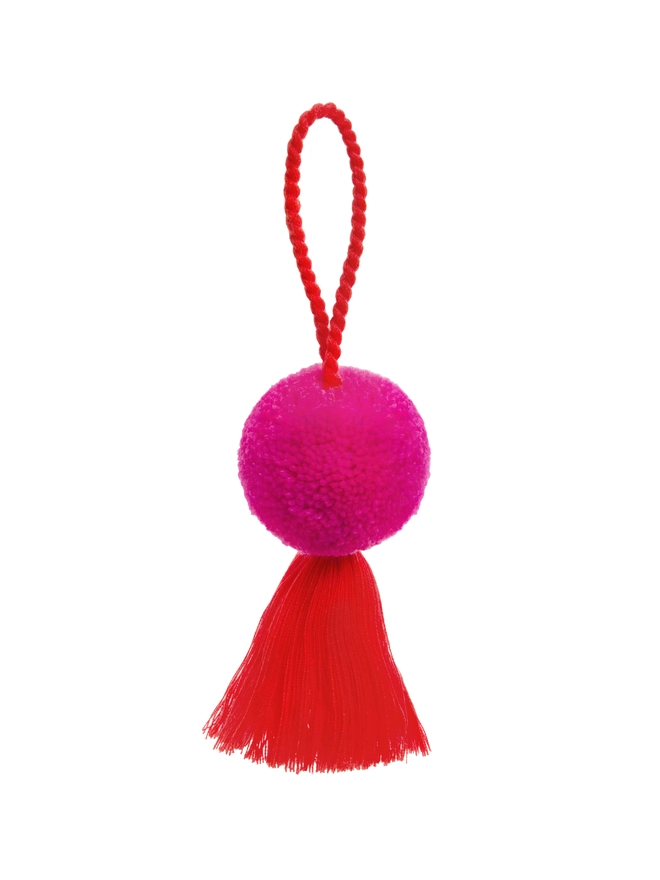 pink pom pom and orange tassel christmas bauble decoration 