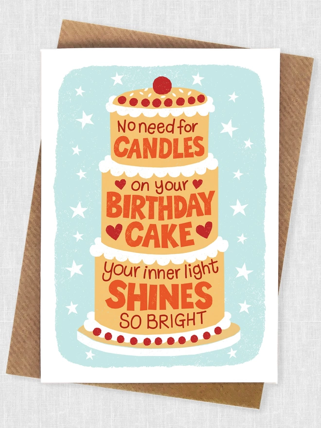 birthday candle cake with kraft brown envelope
