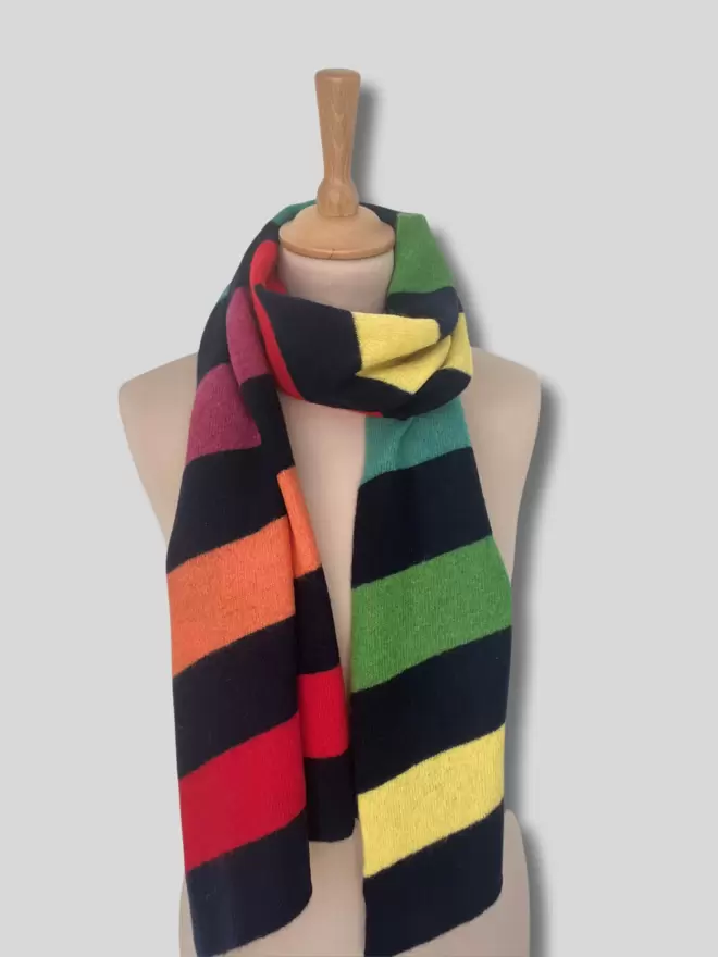 Navy scarf with colourful stripe on a mannequin