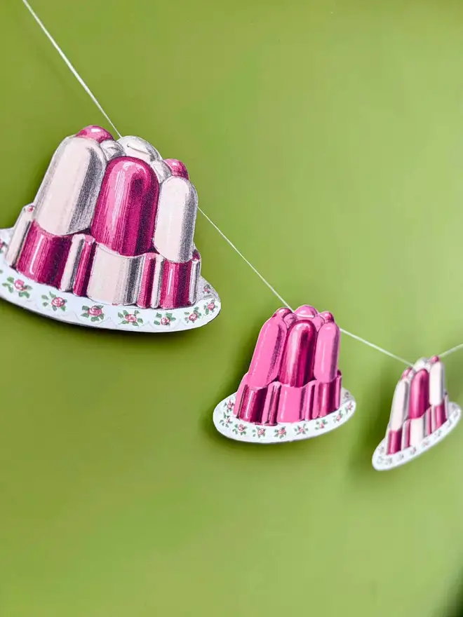 A string of pink and white jelly bunting