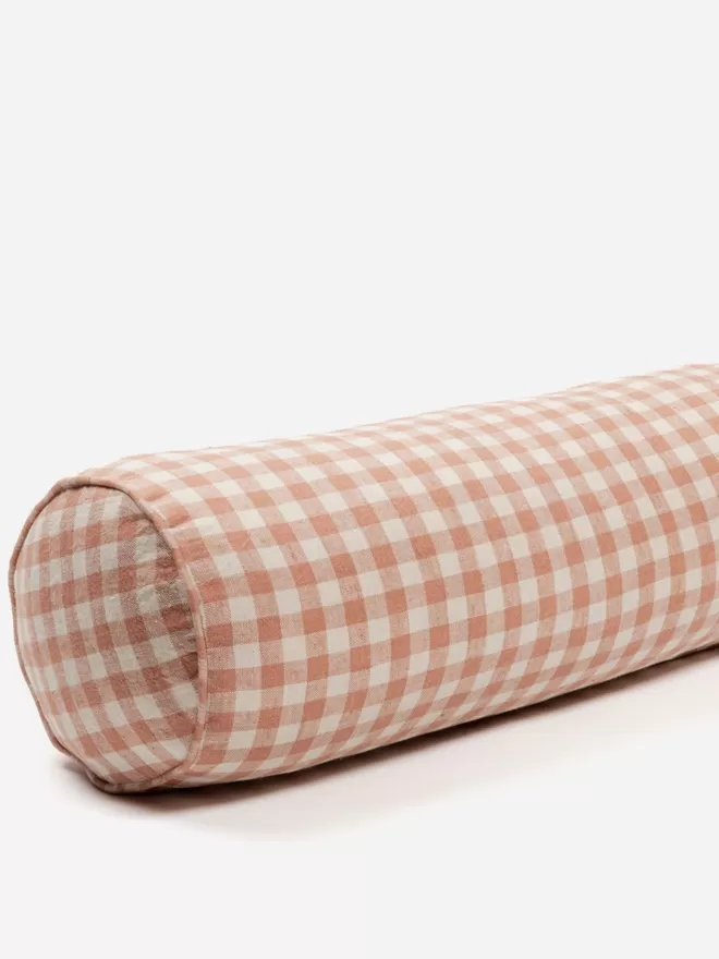 Linen Bolster Cushion 'Rose Gingham' front, angled slightly shot of the cushion to see thickness, diameter and length of the bolster cushion