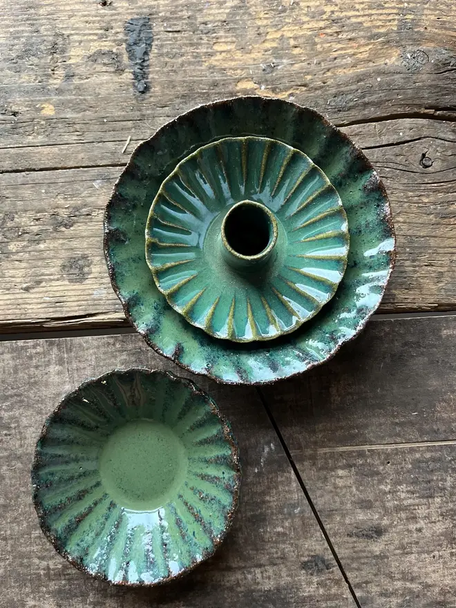 Handmade Green Ceramic Candlestick Holder, a pair of green candlestick holders sitting on a wooden surface. 