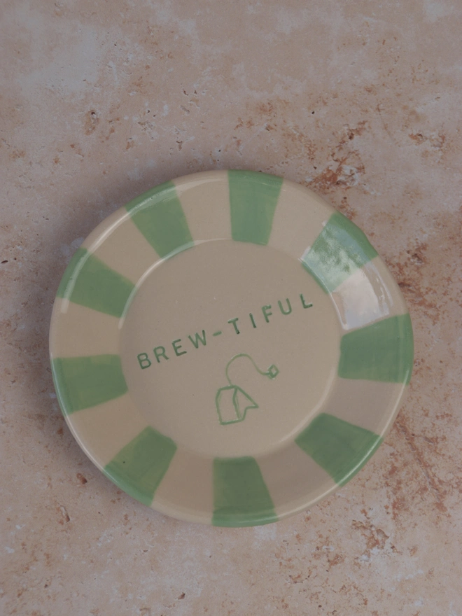 Green striped ceramic Brew-tiful tea bag plate