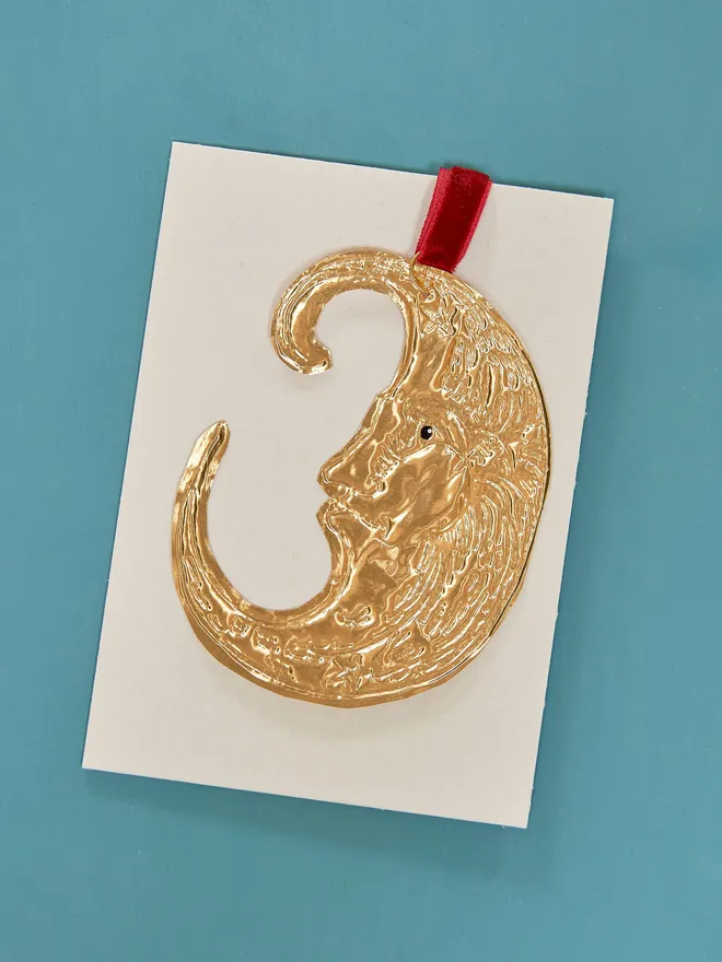 Moon tin embossed Christmas tree decoration