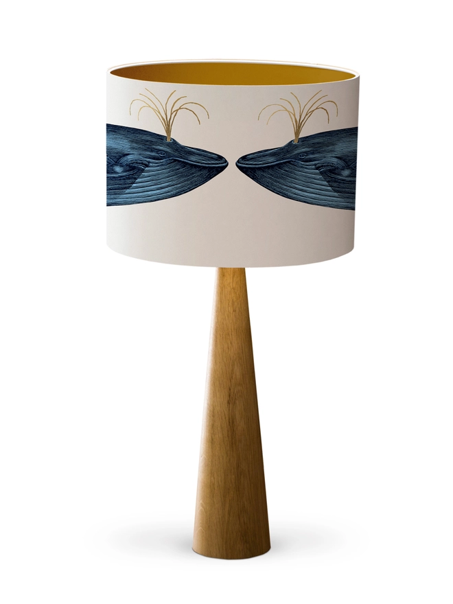 Handmade blue whale lampshade with gold details featuring vintage inspired ocean artwork