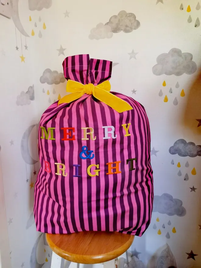 Merry & bright purple & purple stripe sack
