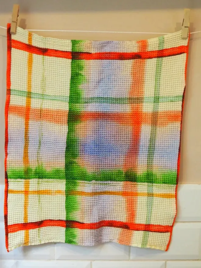 Check Waffle Tea towel, hanging. 