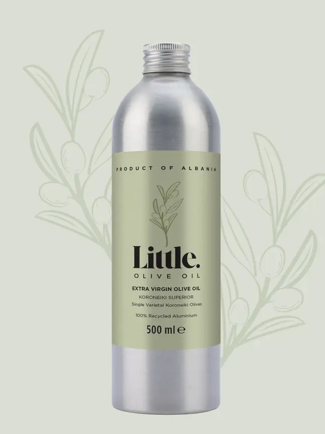 stainless steel bottle of olive with light green label and green background