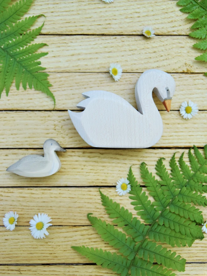 Handmade ecofriendly wooden toy figurines, swan and cygnet toy figures made by hand by Eric and Albert made in Wales, UK