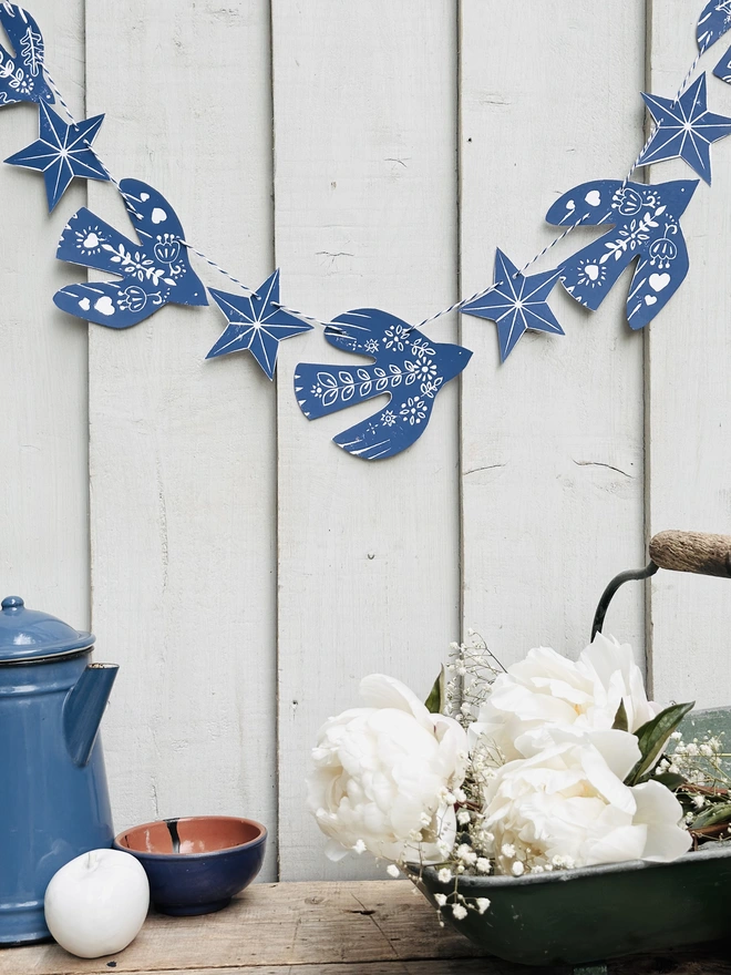 Traditional Nordic folk birds Linocut garland blue