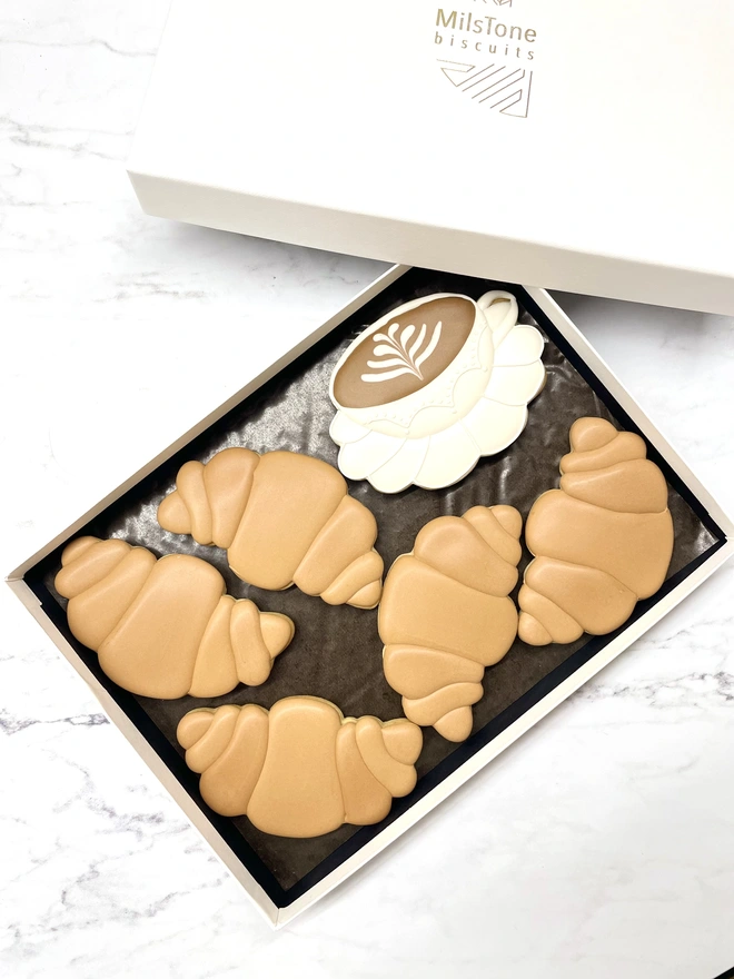 Luxury coffee and croissant iced biscuit gift box by Milstone Biscuits, hand-decorated biscuits presented in a white gift box
