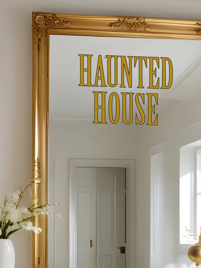 haunted house wall sticker on a mirror