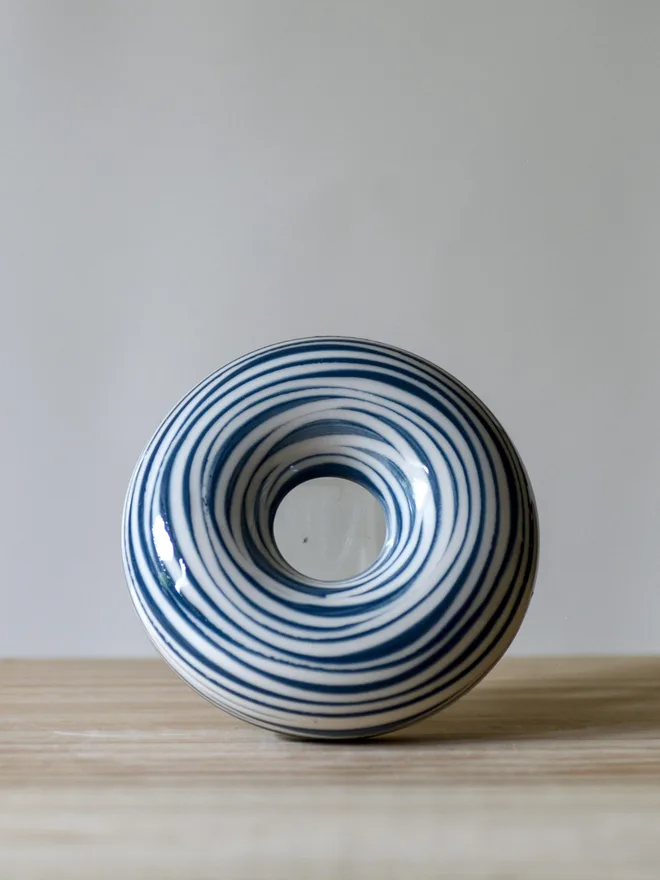 Avocado Planter White & Blue Handmade porcelain avocado planter with carved blue pattern, designed to hold an avocado seed for sprouting