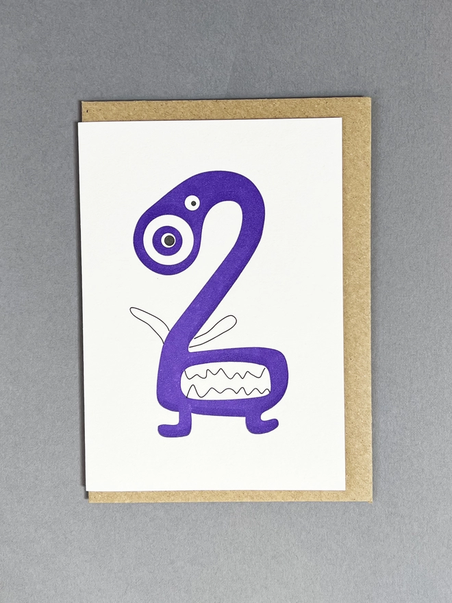 Playfully hand drawn letterpress printed number two with envelope for children's party