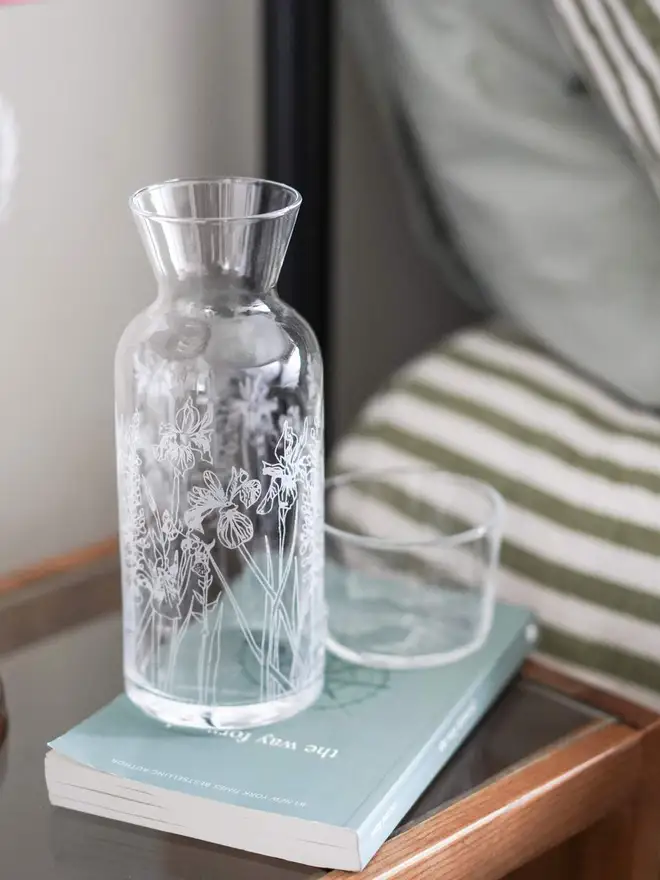 Floral Mini Carafe & Glass Set, on a clear table. 