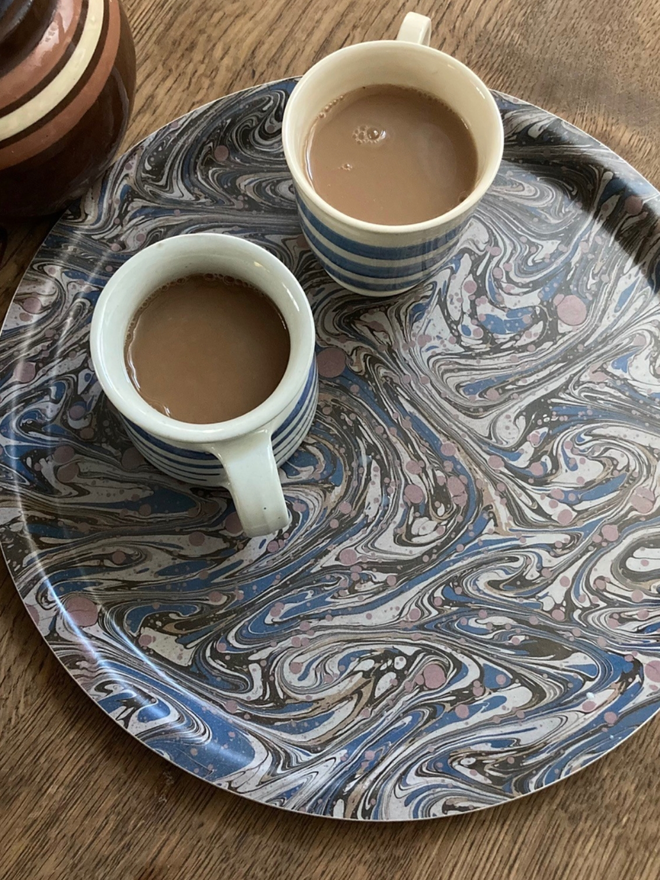 Round Tray. A grey, marbled round tray.