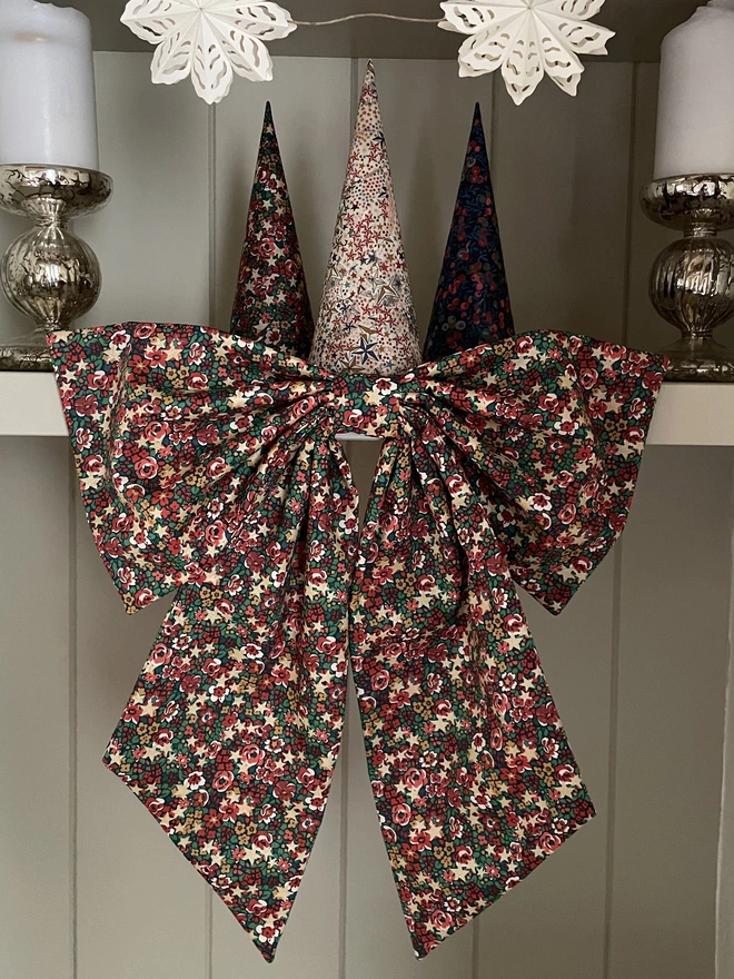 Oversized bow made with Liberty London Emma Etoile fabric, the perfect Christmas decoration