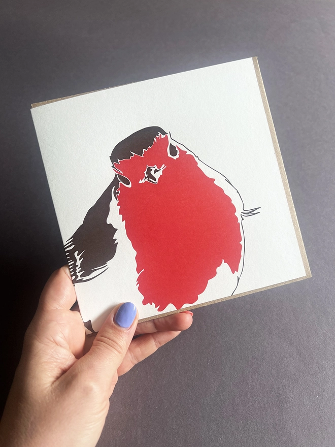 Hand holding the card