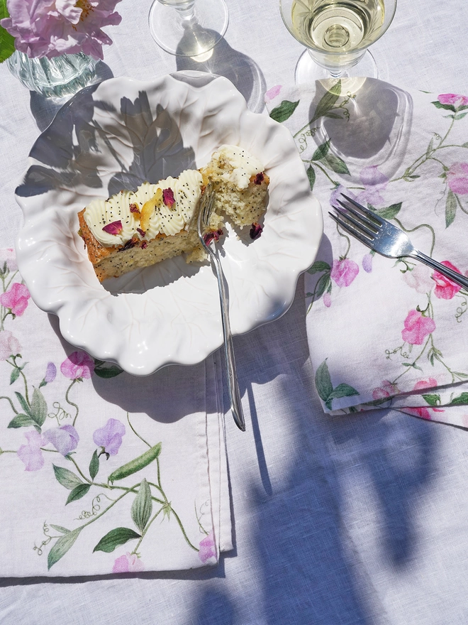 Wine cake and linen napkins printed with sweet peas