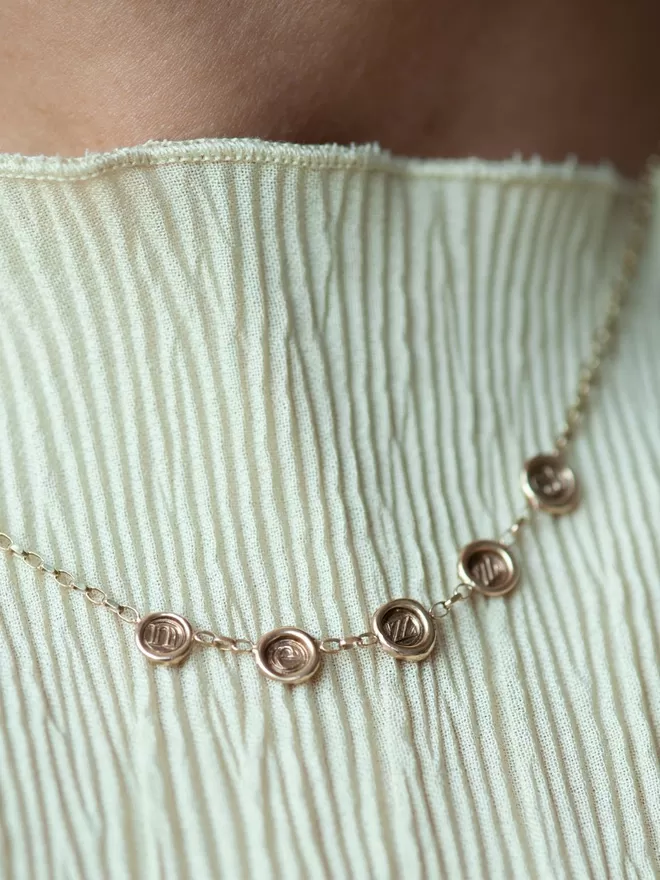 Multi -seal necklace