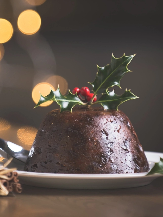 Luxury, Handmade Christmas Pudding, a Christmas pudding sitting on a wooden surface. 
