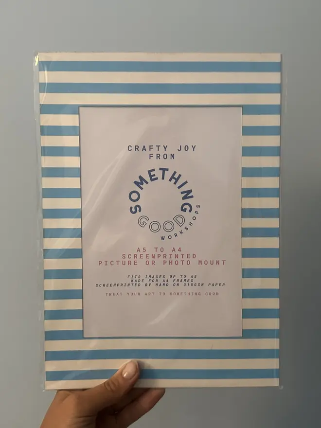 Thin Striped Screen Printed A6 / A5 / A4 Photo Mount. blue mount shown against grey background. 