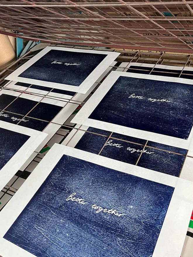 Better Together Woodcut edition on a drying rack