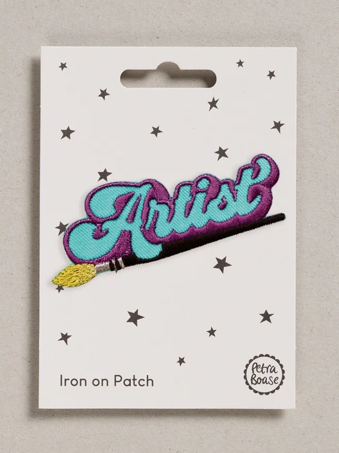 Artist Embroidered iron on fabric patch.