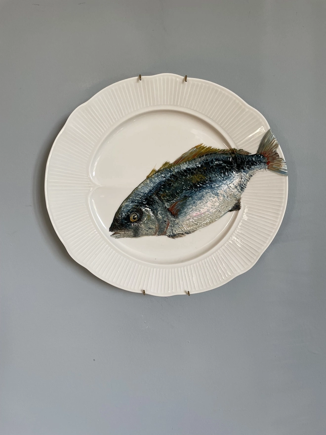 tuna oil painting on plate