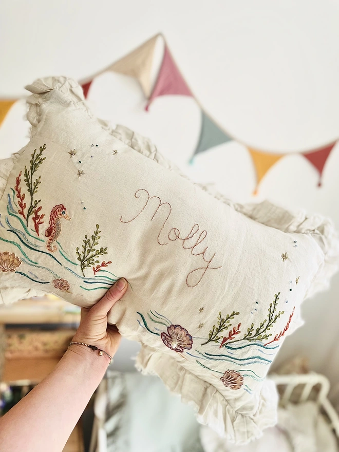 Under the sea, hand embroidered cushion on natural linen with personalised name 