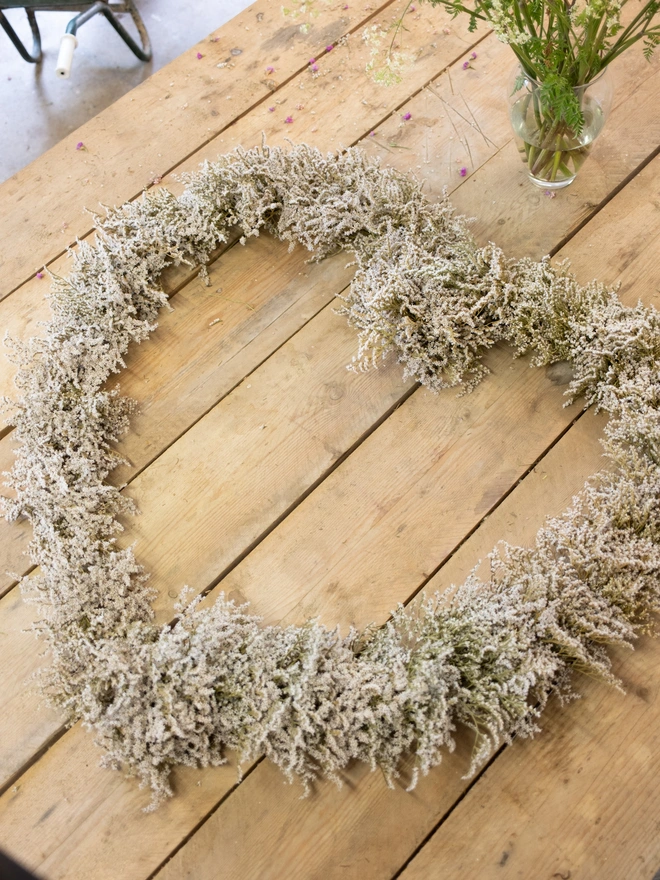 dried statice white heart shaped wreath