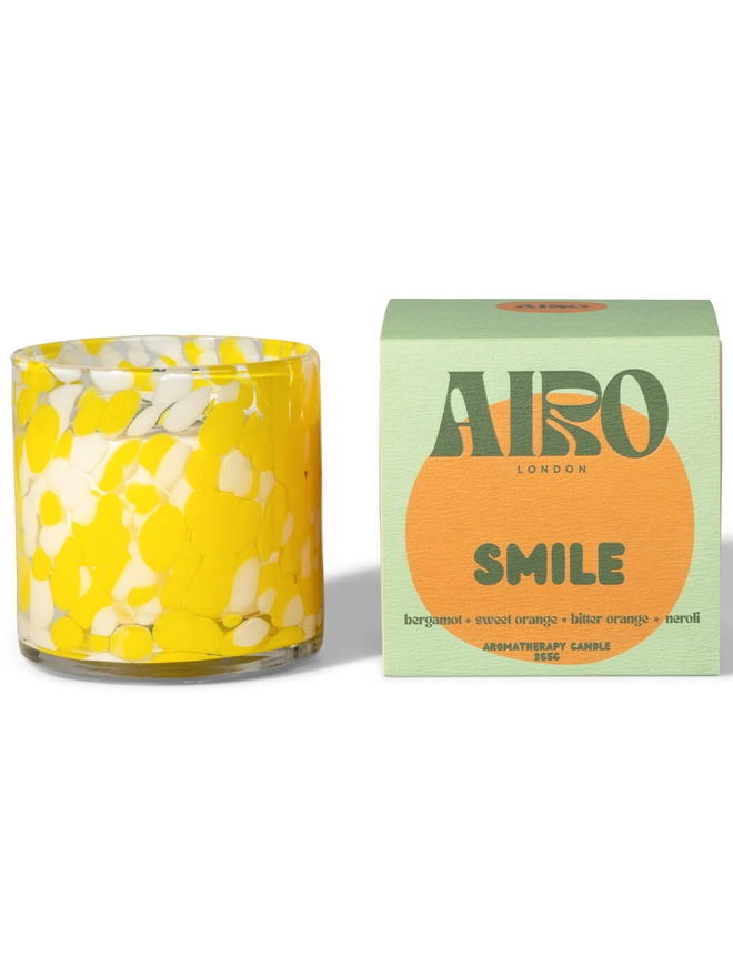 SMILE candle with yellow handblown glass