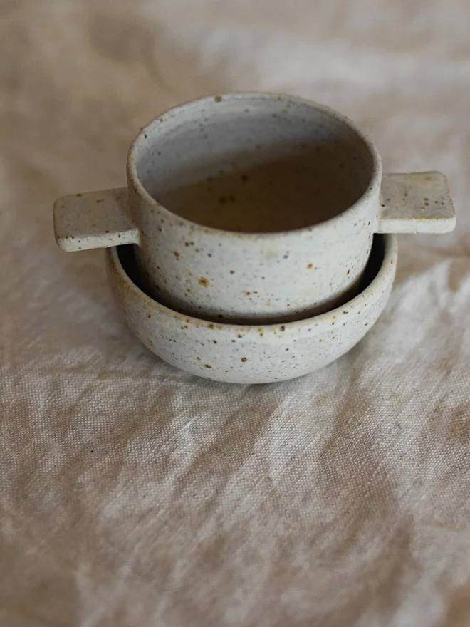 stoneware tea strainer and dish