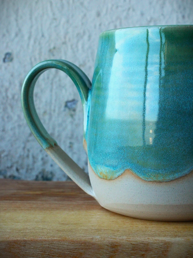 ceramic mug with green glaze