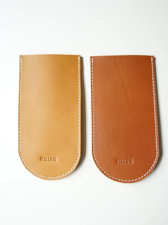 different brown leather glasses case