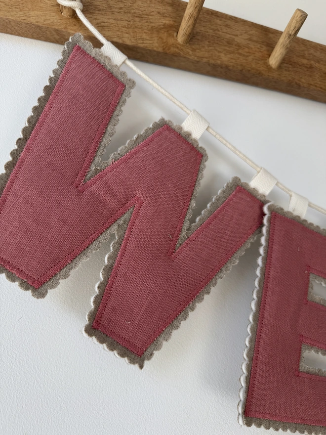 Linen Name Garland. The letter W in a pink linen