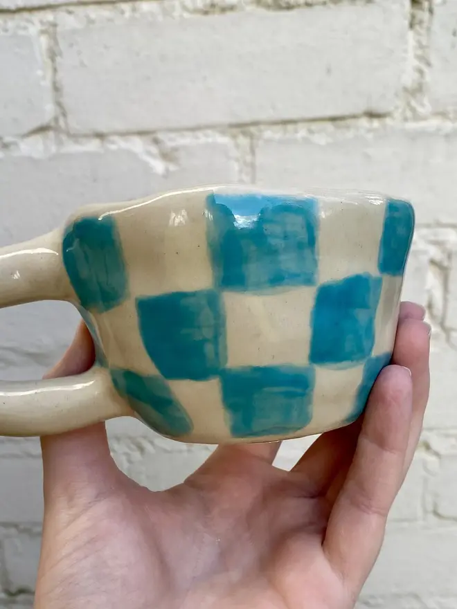 blue white check handmade ceramic smiley face mug