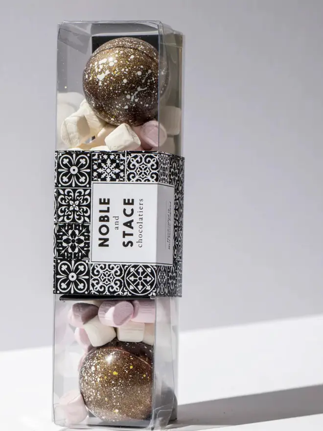 Hot Chocolate Bombes With Mini Mallows Pack Of 3, standing on a white table. 
