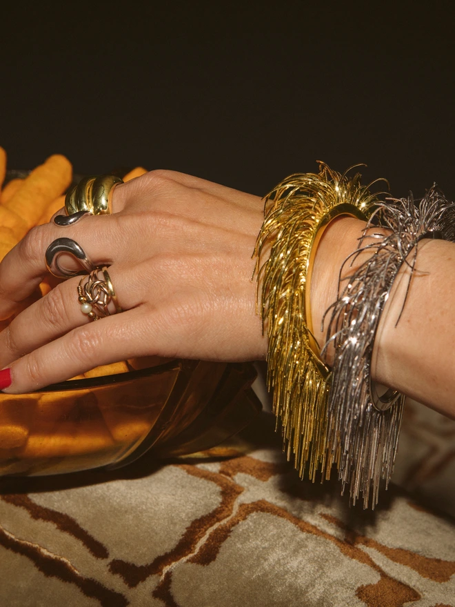 Loel Lifestyle Feather Cuffs
