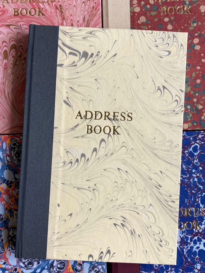 Thick Address Book. A closed address book.