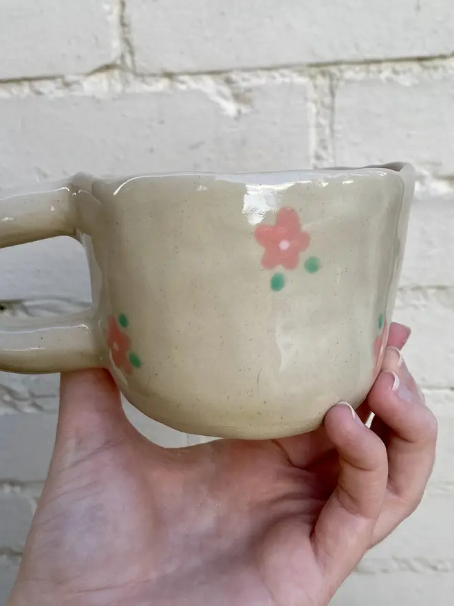 pink flower painted handmade ceramic smiley face mug