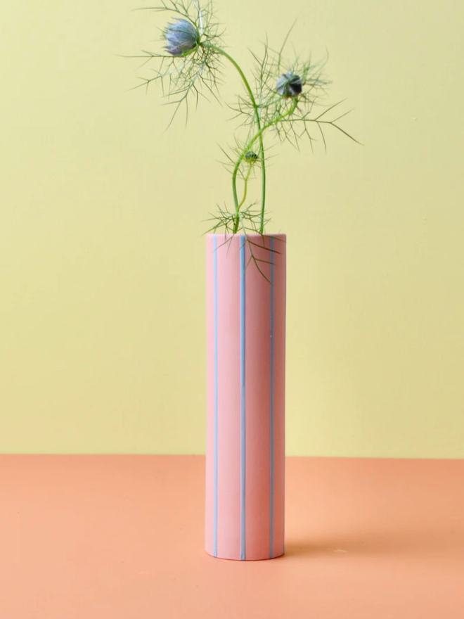 Striped Vase. A pink and blue striped vase.