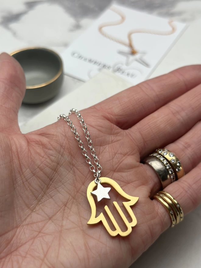 gold hamsa hand charm and sterling silver mini star with sterling silver chain