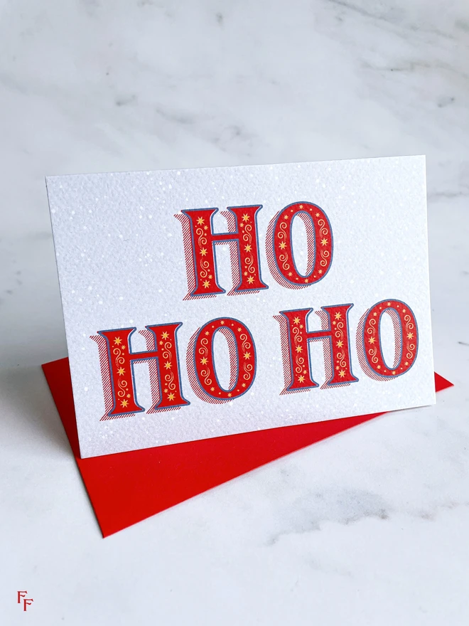 'Ho Ho Ho' charity christmas card, Typography, Lettering, blue and red, vintage aesthetic, flora fricker