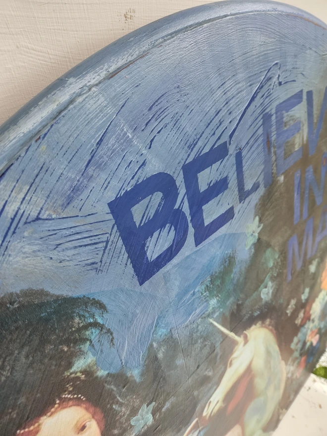 Unicorn art panel made from an upcycled table-top.