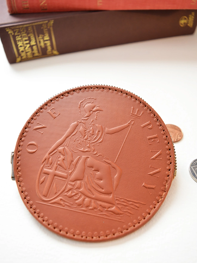 a tan leather historical one penny coin purse of Britannia by natthakur