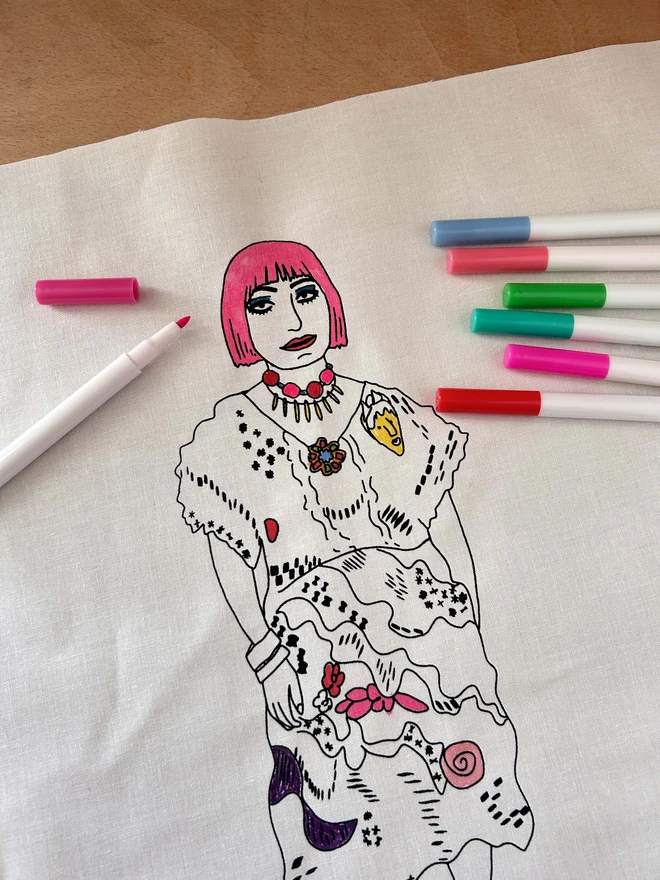 A craft kit to Sew Your Own Idol which contains a black and white fabric cushion featuring an illustration of Zandra Rhodes.